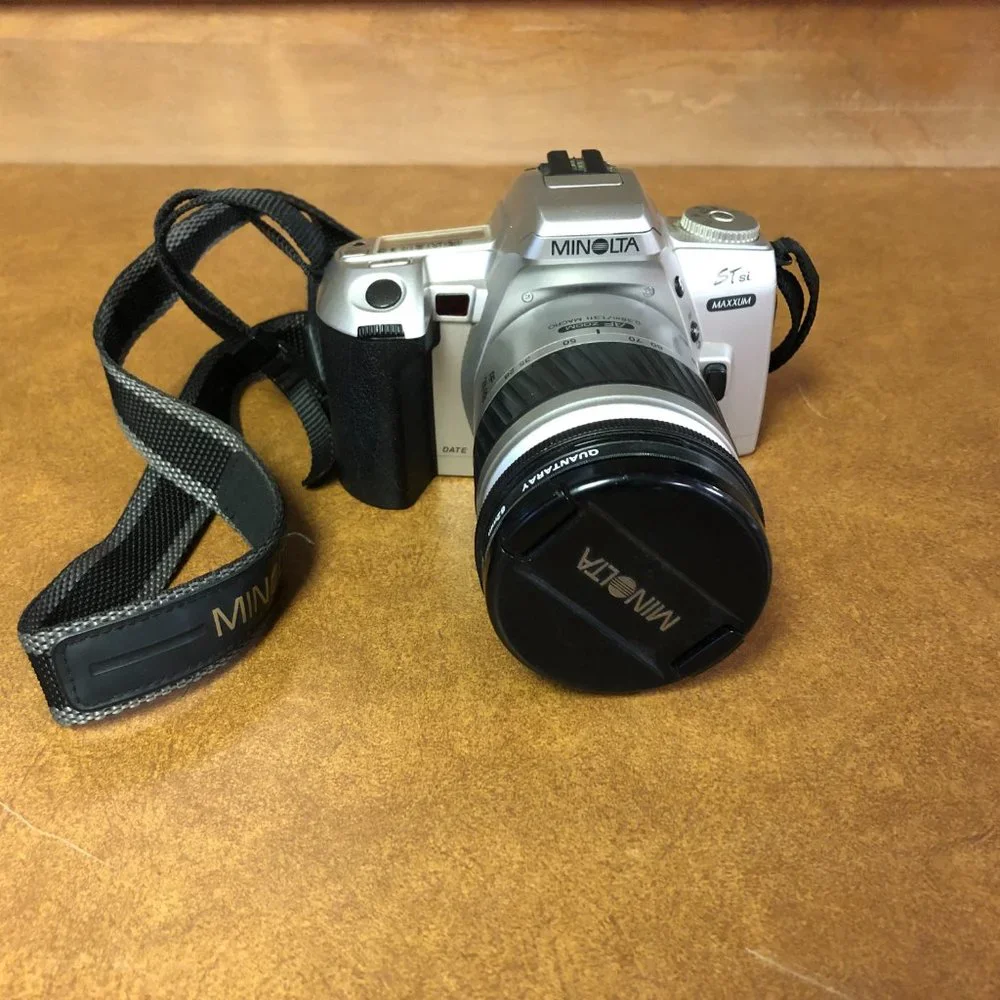 Minolta Maxxum STsi 35mm Film Camera with Minolta 28-80mm AF Zoom Lens